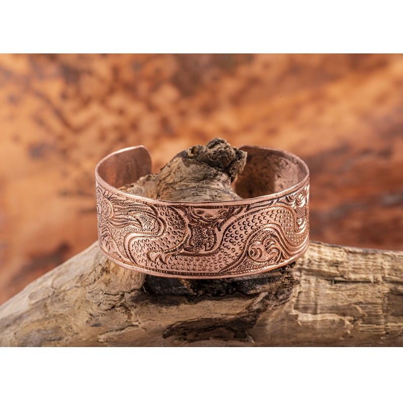 Koperen armband met drakenpatroon