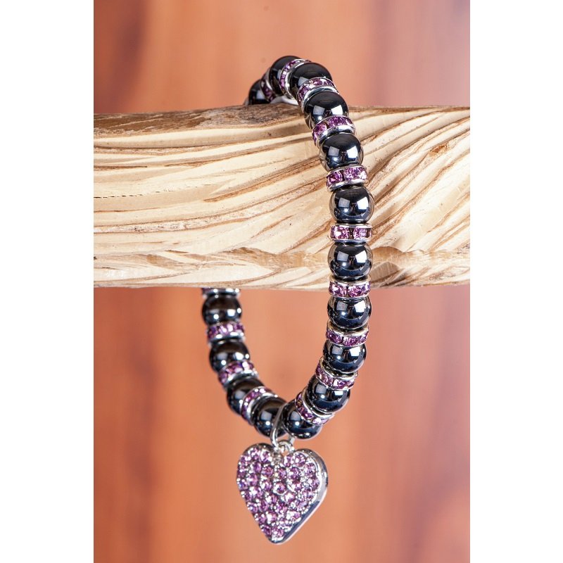 Magneet armband met roze kristal stenen