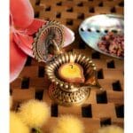 Ghee lamp Pauw Messing